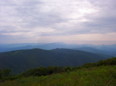 View from the 'Pleasant Gardens'
Can see Big Bald, Little Bald, Flattop mountains (and more) in the distance...
closer in is the 'Beauty Spot' field.
The Appalachian Trail goes over all of these places. 
July 2009
