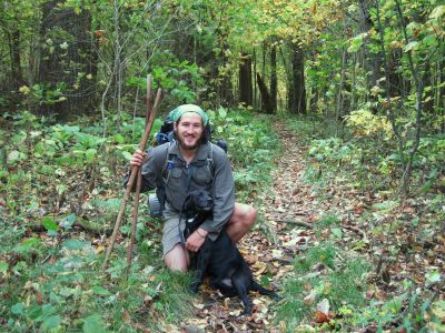 Bunyip and Grayson
Southbound Thru-hiker with the puppy that followed him out of the Grayson Highlands.  Photo taken near Spivey Gap, 10-15-2010
