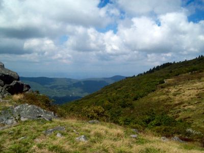 Views
Buzzard Rock on the left, summit of Whitetop Mountain back toward the right, and the Iron Mountain chain in the distance...
9-09
