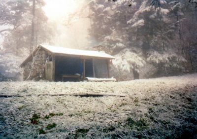 Jerry Cabin
Sam`s cabin during a snowstorm, 
before someone burned the old table.
