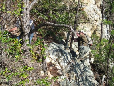Rough Trail...
Rat and Tyler climb the 'trail' back up to the overlook rocks from the cliff's edge,
3-19-10
